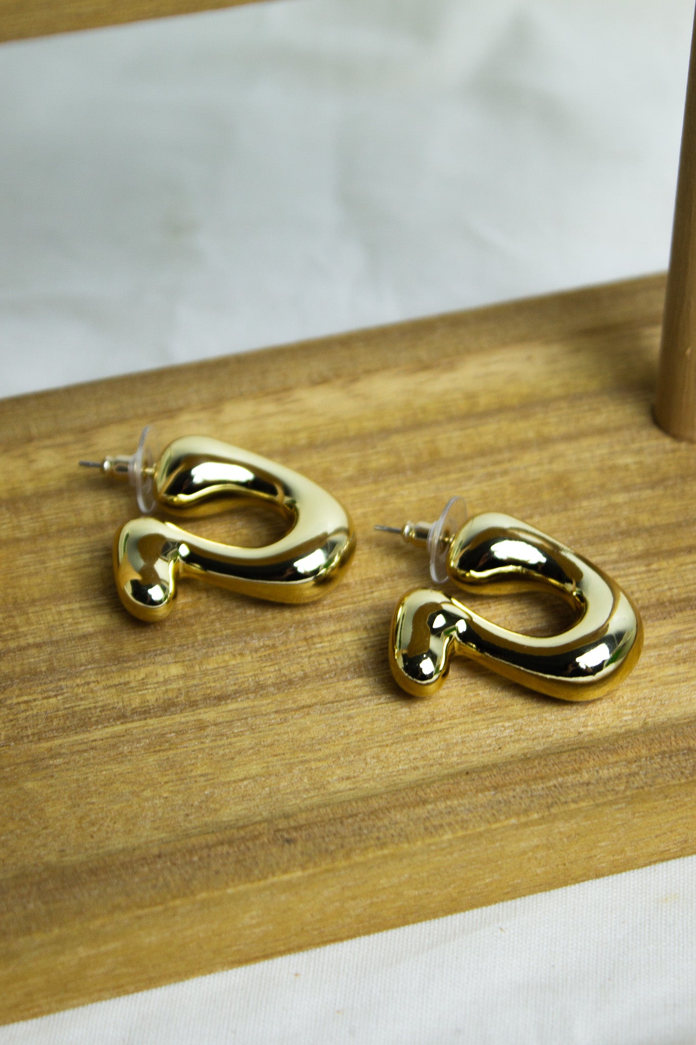 Brinco Melt - Dourado